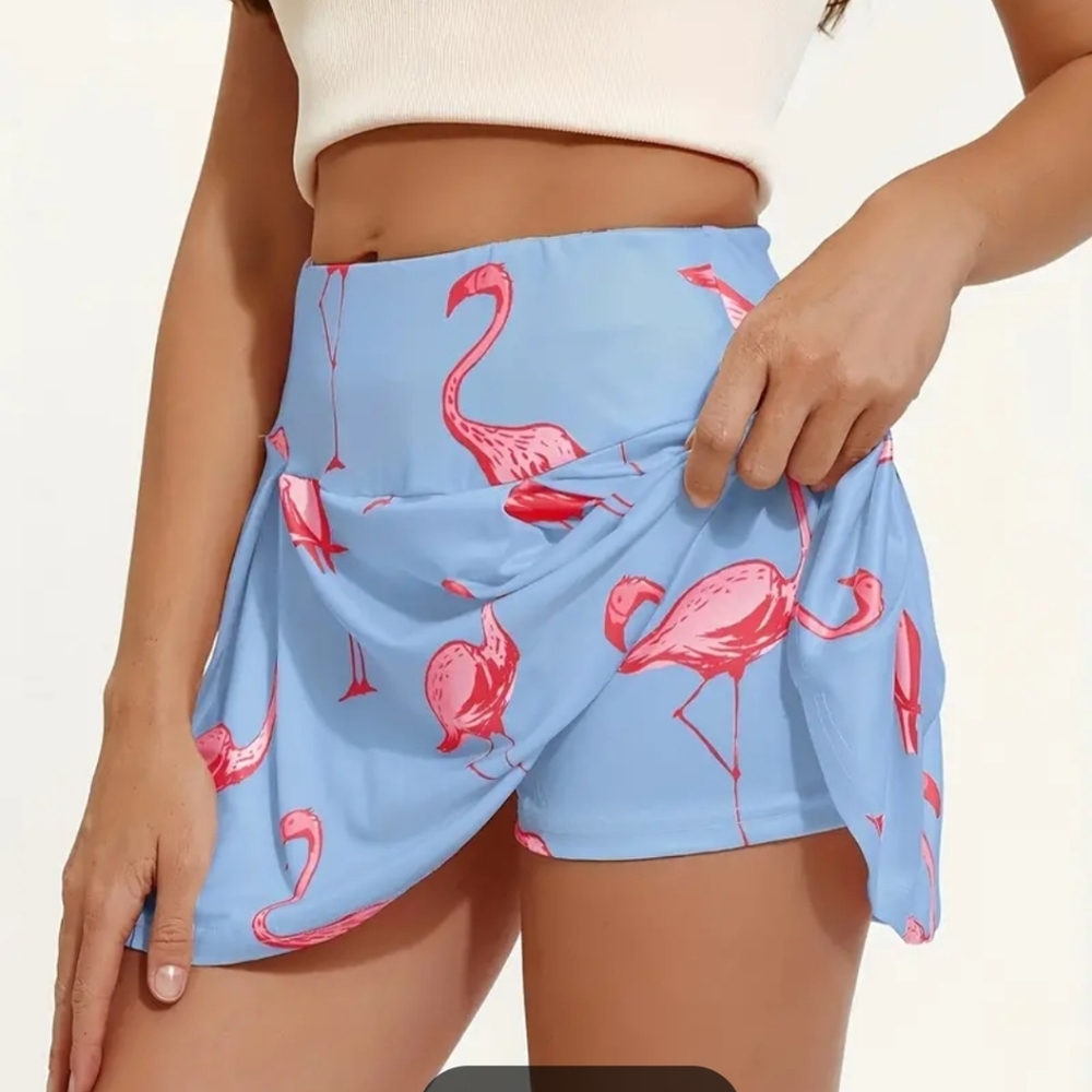 Delightful pink flamingos on baby blue background athleisure skort.  Brand new L